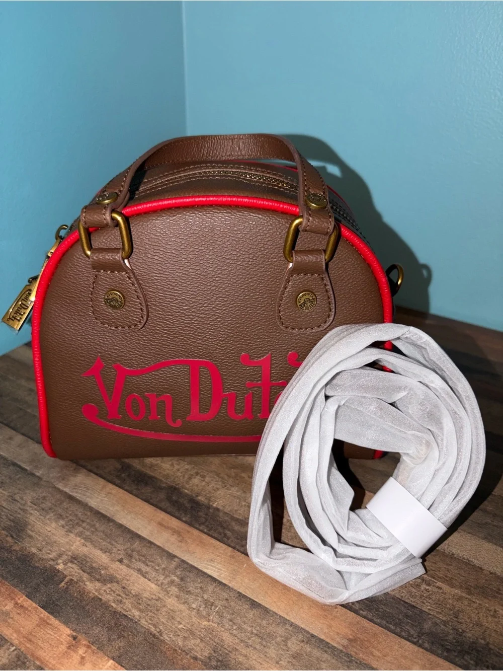 Von Dutch Brown Bowling Bag with Red Logo Trim and Shoulder Strap. NWOT